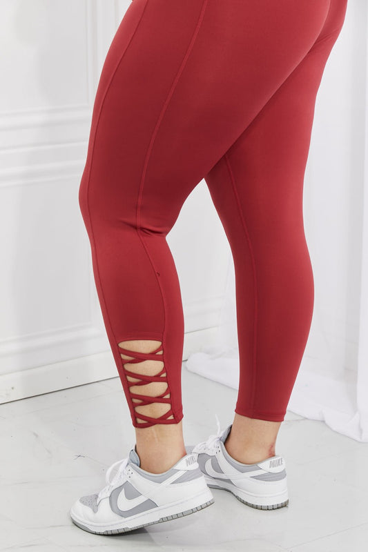Yelete Ready For Action Full Size Ankle Cutout Active Leggings in Brick Red - pvmark